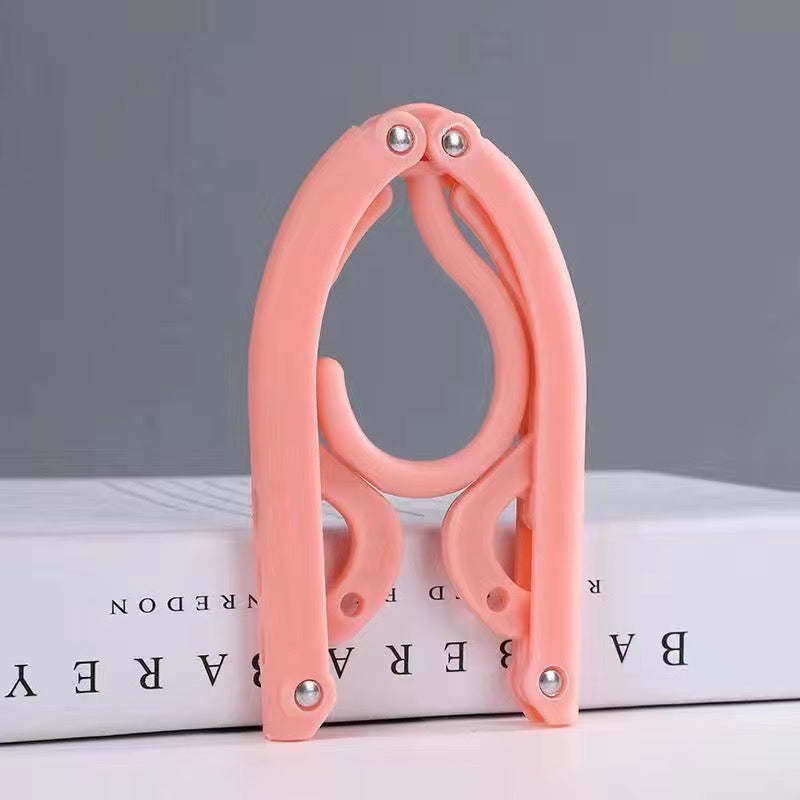 Multifunctional folding hanger