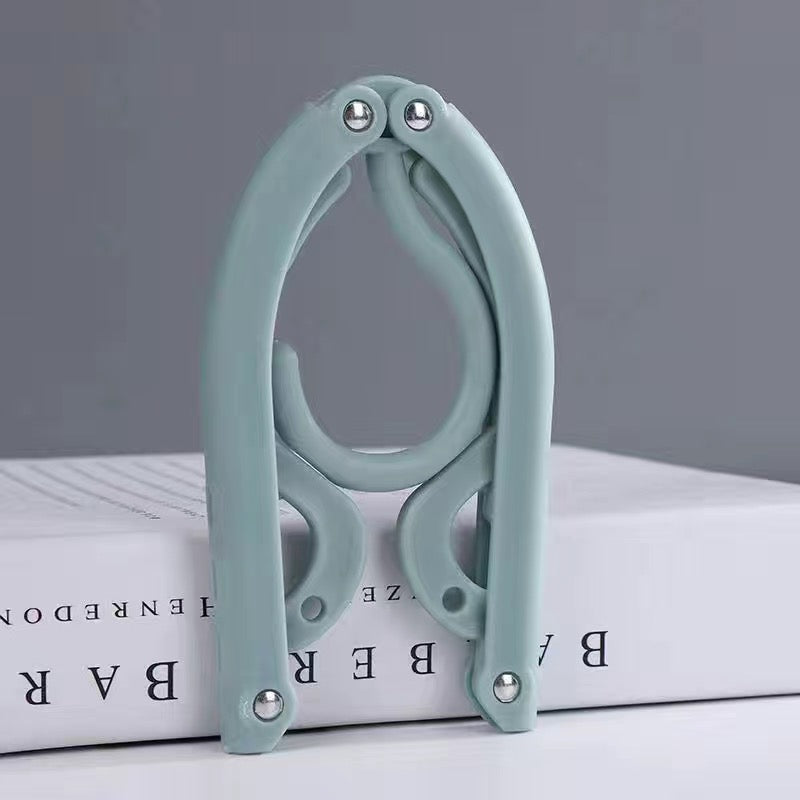 Multifunctional folding hanger