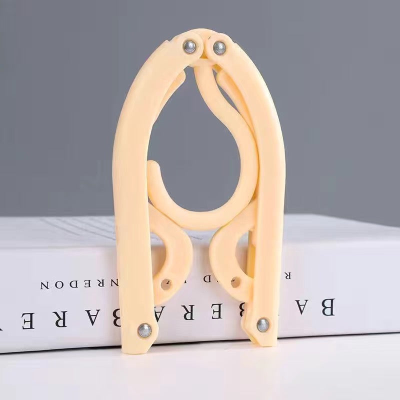 Multifunctional folding hanger